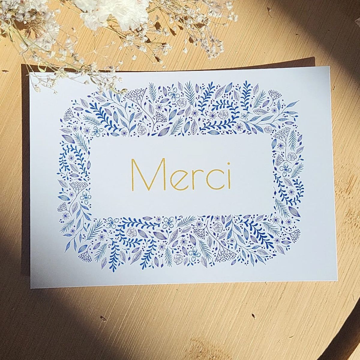 Carte postale “Merci” bleue